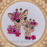 Baby giraffe and mother