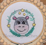 Hippo in wreath with stars